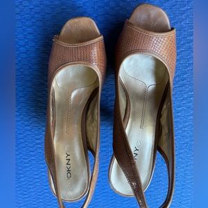 DKNY sling backs brown leather textured upper and wood platform and heel.